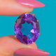 14ct Gold Synthetic Colour-Change Sapphire Pendant - 14.80cts, front detail of the violet Synthetic Sapphire